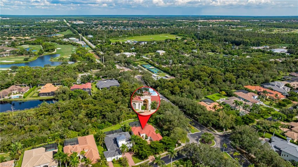20481 Chapel Trace Estero, FL 33928 - Photo 43 of 50 an aerial view of residential houses with outdoor space and trees