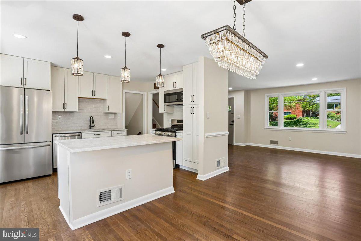 10701 Brunswick Avenue Silver Spring, MD 20902 - Photo 11 of 50 Dining Room Opens to the Kitchen