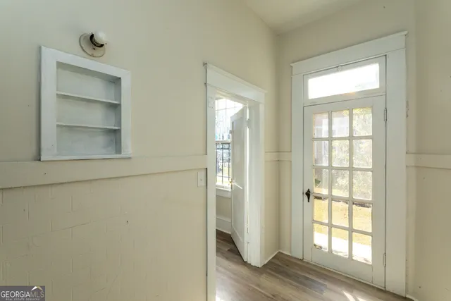 a view of an empty room and window