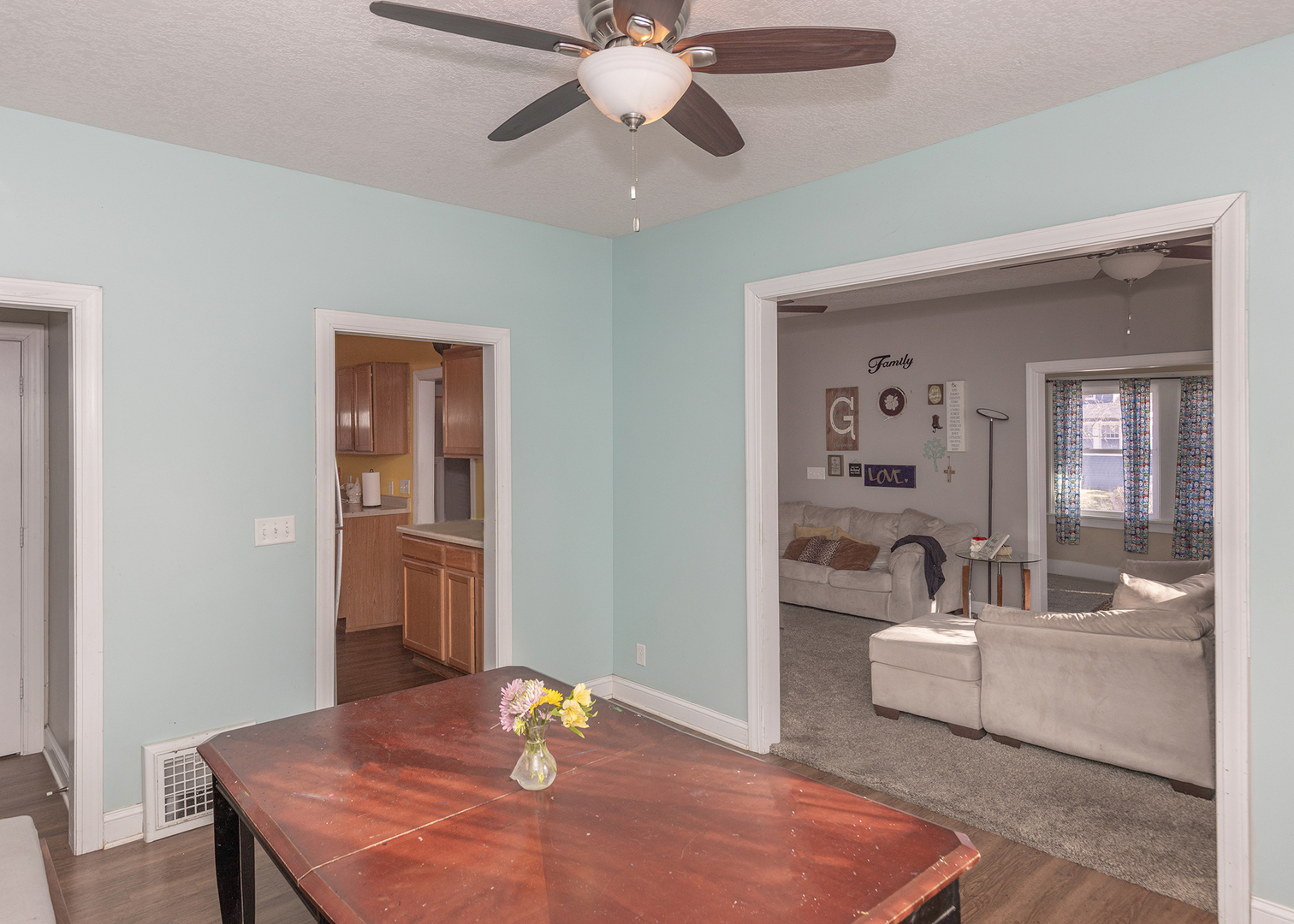 2330 38th Street Rock Island, IL 61201 - Photo 11 of 34 a living room with furniture and wooden floor