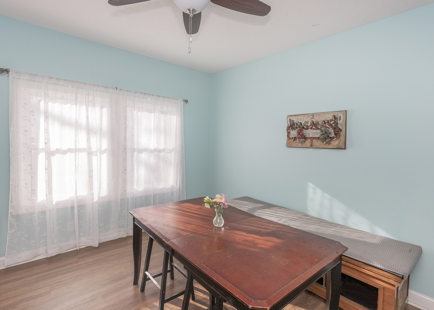 2330 38th Street Rock Island, IL 61201 - Photo 13 of 34 a view of a room with a table chairs and wooden floor