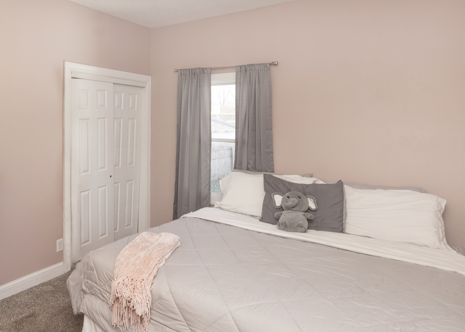 2330 38th Street Rock Island, IL 61201 - Photo 18 of 34 a bedroom with a bed and a window