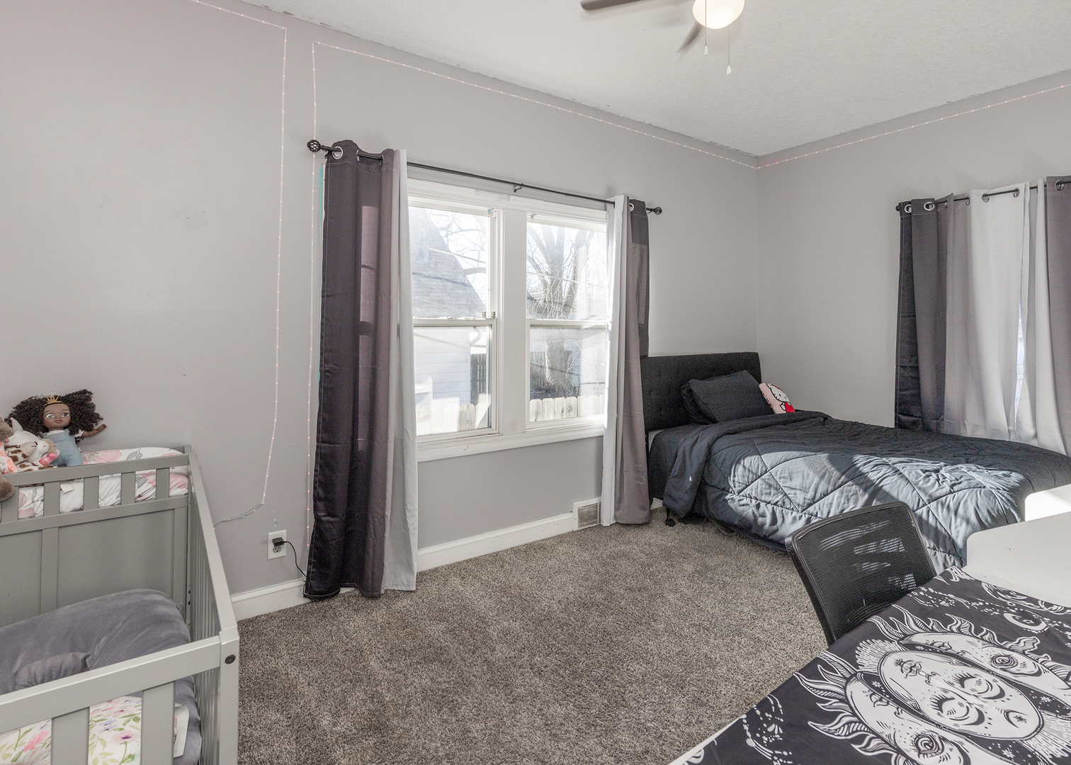 2330 38th Street Rock Island, IL 61201 - Photo 20 of 34 a bedroom with a bed and a window
