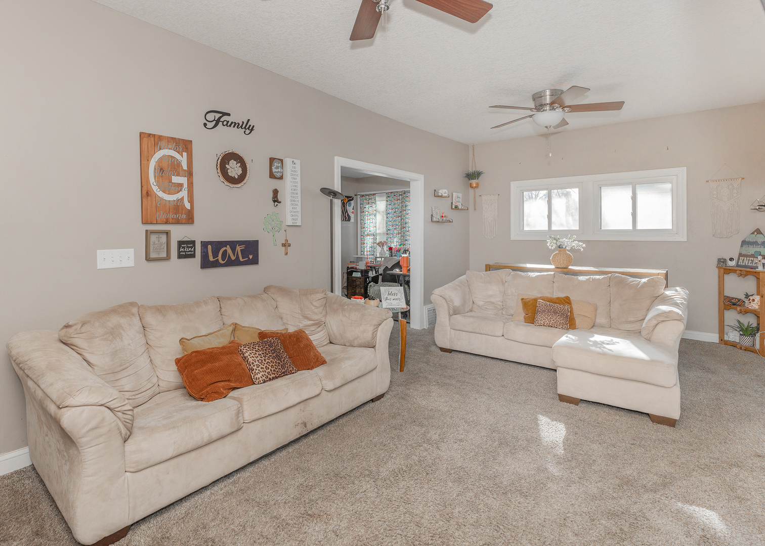 2330 38th Street Rock Island, IL 61201 - Photo 2 of 34 a living room with furniture and a chandelier