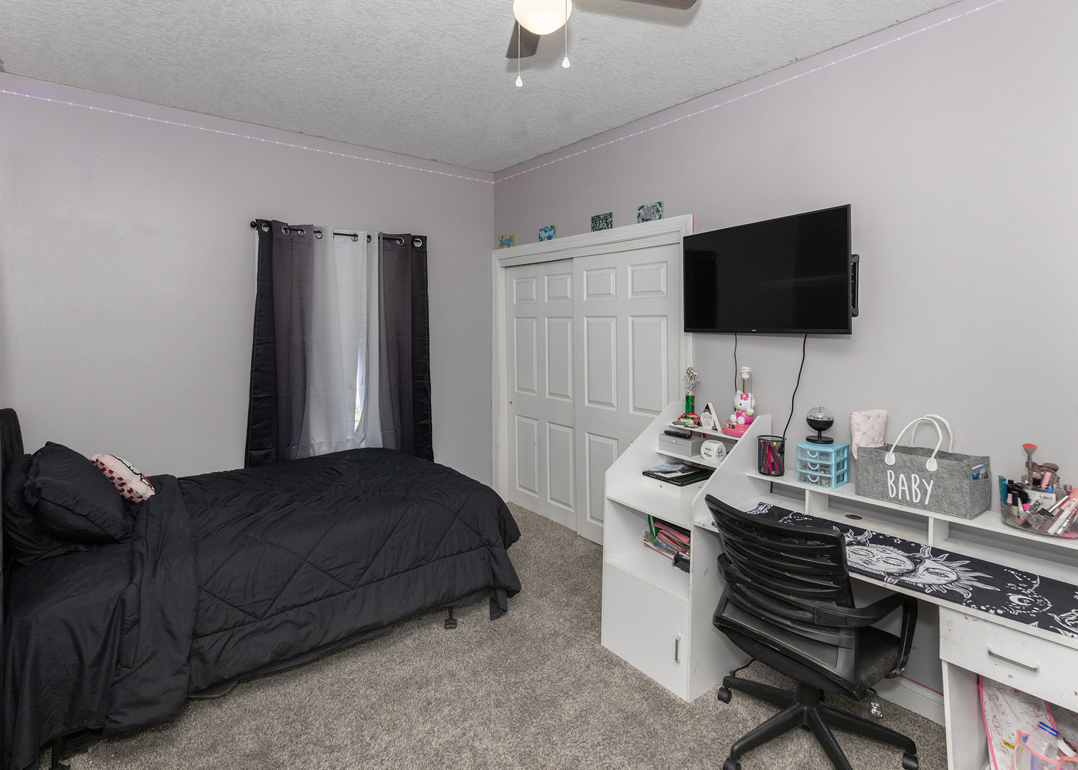 2330 38th Street Rock Island, IL 61201 - Photo 21 of 34 a bedroom with a bed and a flat screen tv