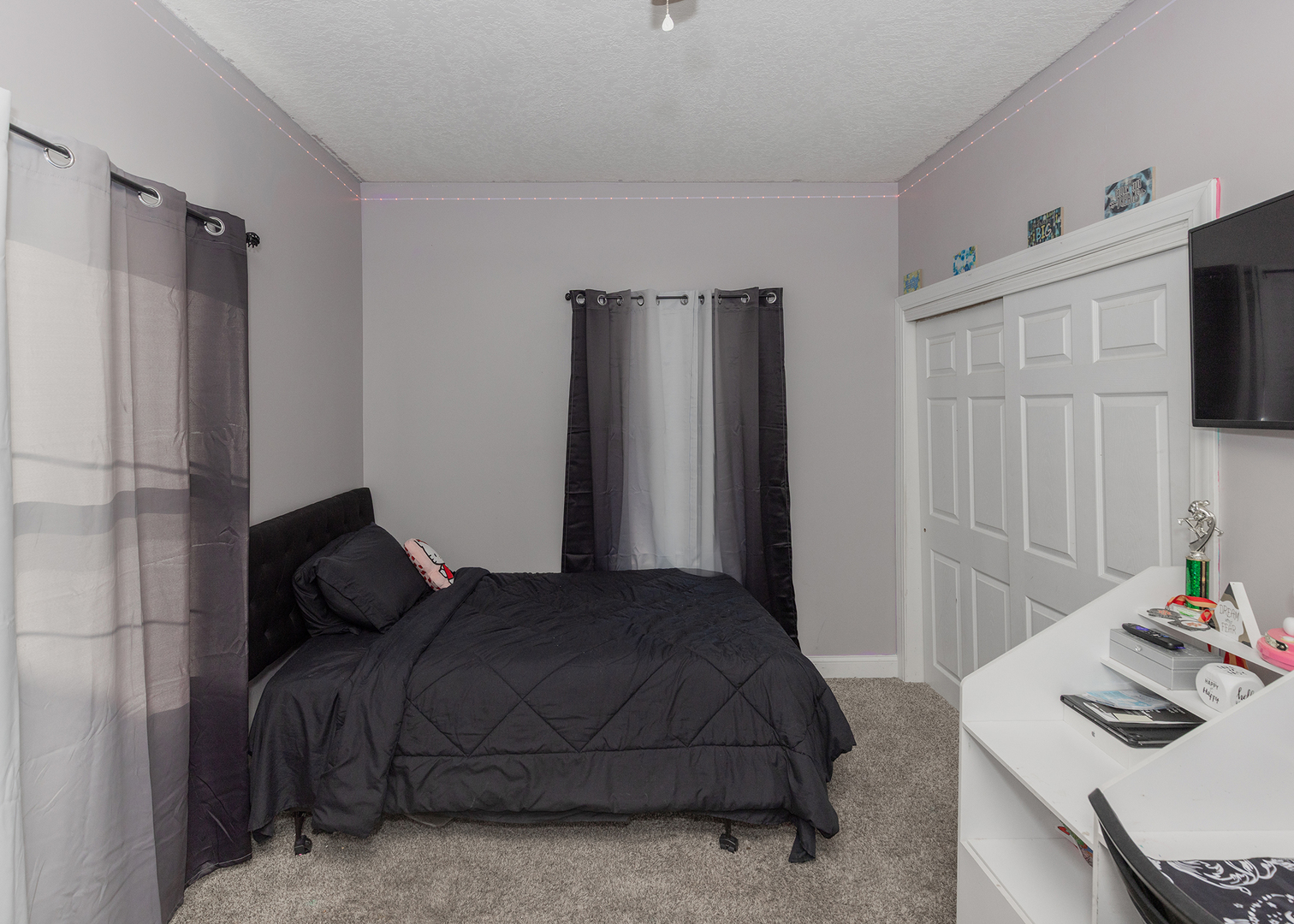 2330 38th Street Rock Island, IL 61201 - Photo 22 of 34 a bedroom with a bed and a mirror