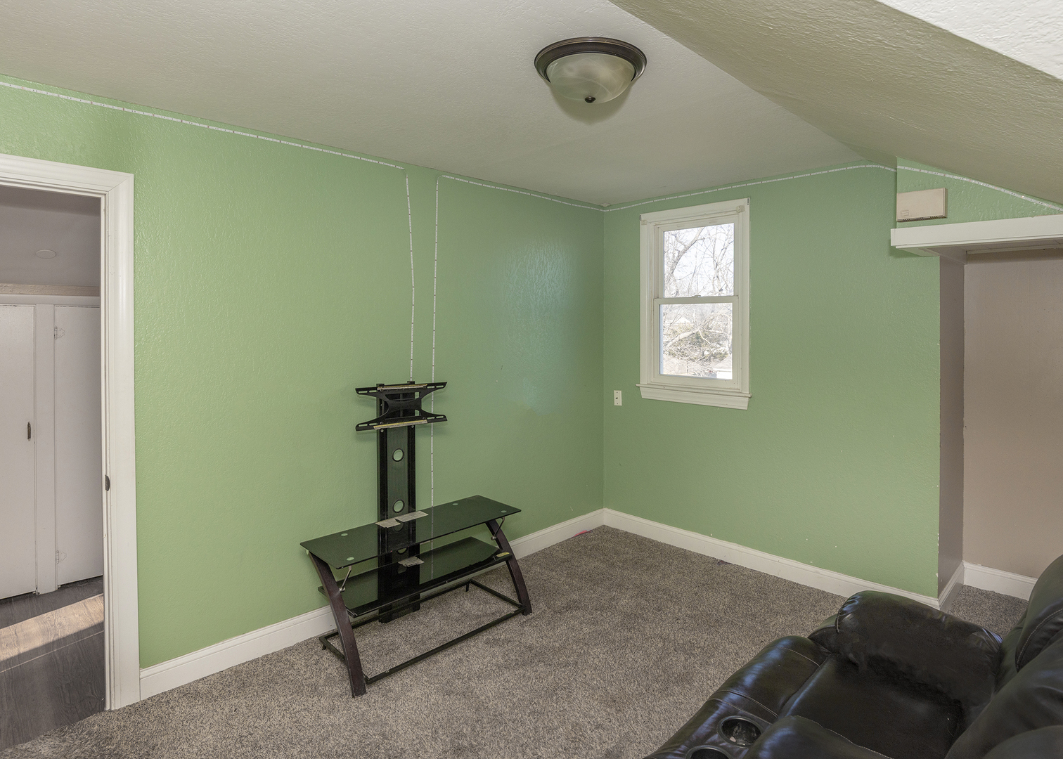 2330 38th Street Rock Island, IL 61201 - Photo 27 of 34 a living room with furniture and a window
