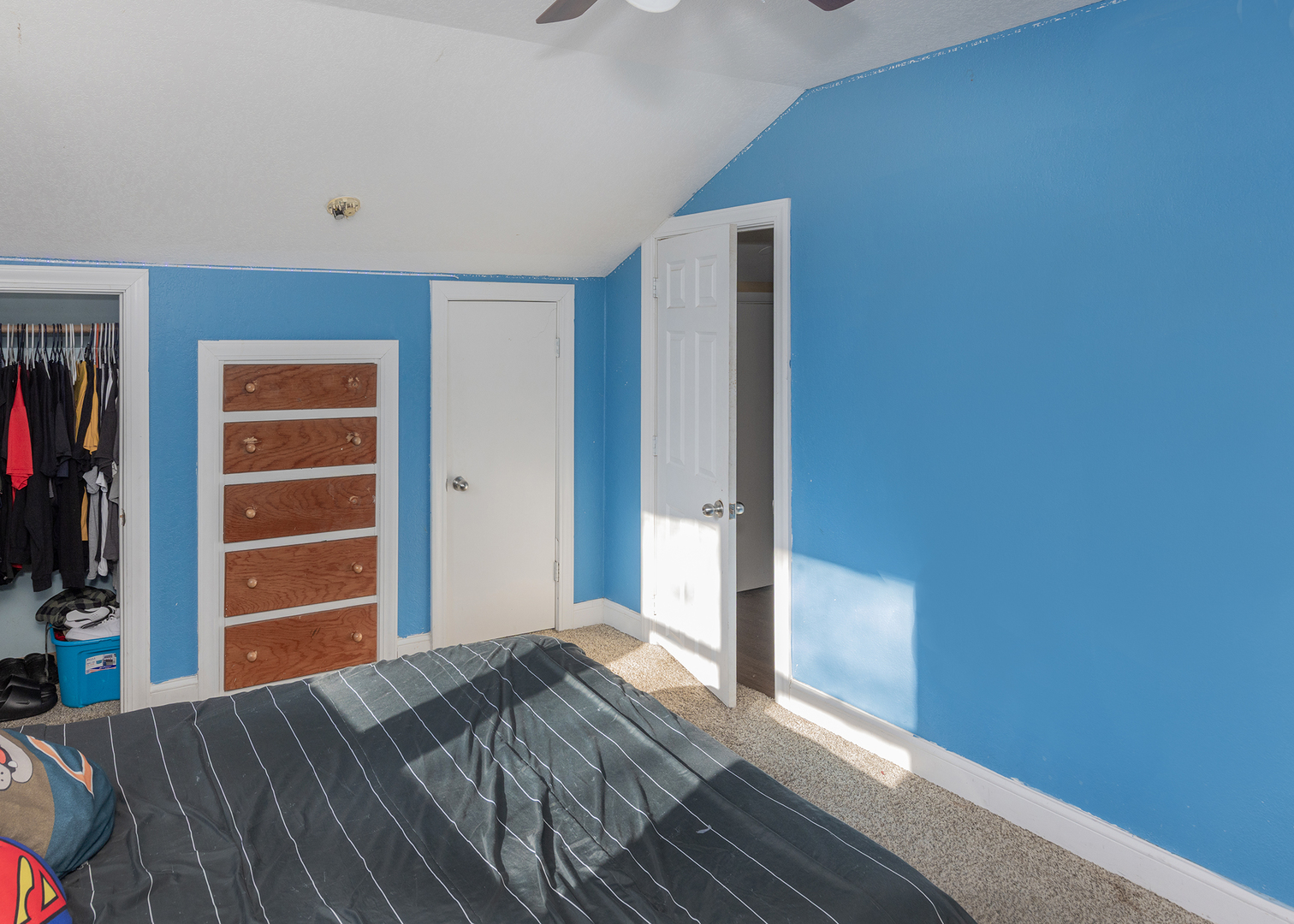 2330 38th Street Rock Island, IL 61201 - Photo 30 of 34 a view of a bedroom with wooden floor and closet