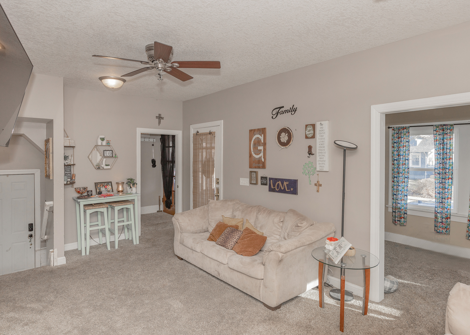 2330 38th Street Rock Island, IL 61201 - Photo 3 of 34 a living room with furniture and a table