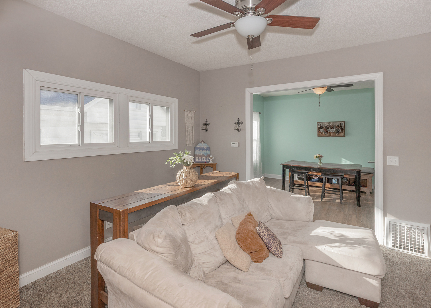 2330 38th Street Rock Island, IL 61201 - Photo 4 of 34 a living room with furniture and a table