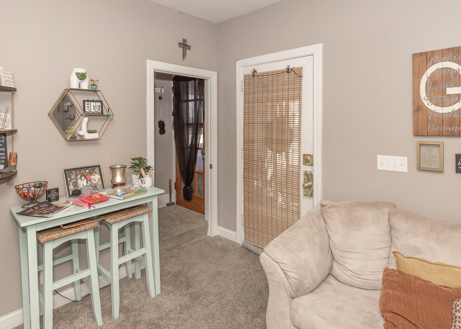 2330 38th Street Rock Island, IL 61201 - Photo 5 of 34 a living room with furniture and a window
