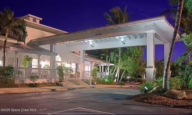 a view of a building with a porch