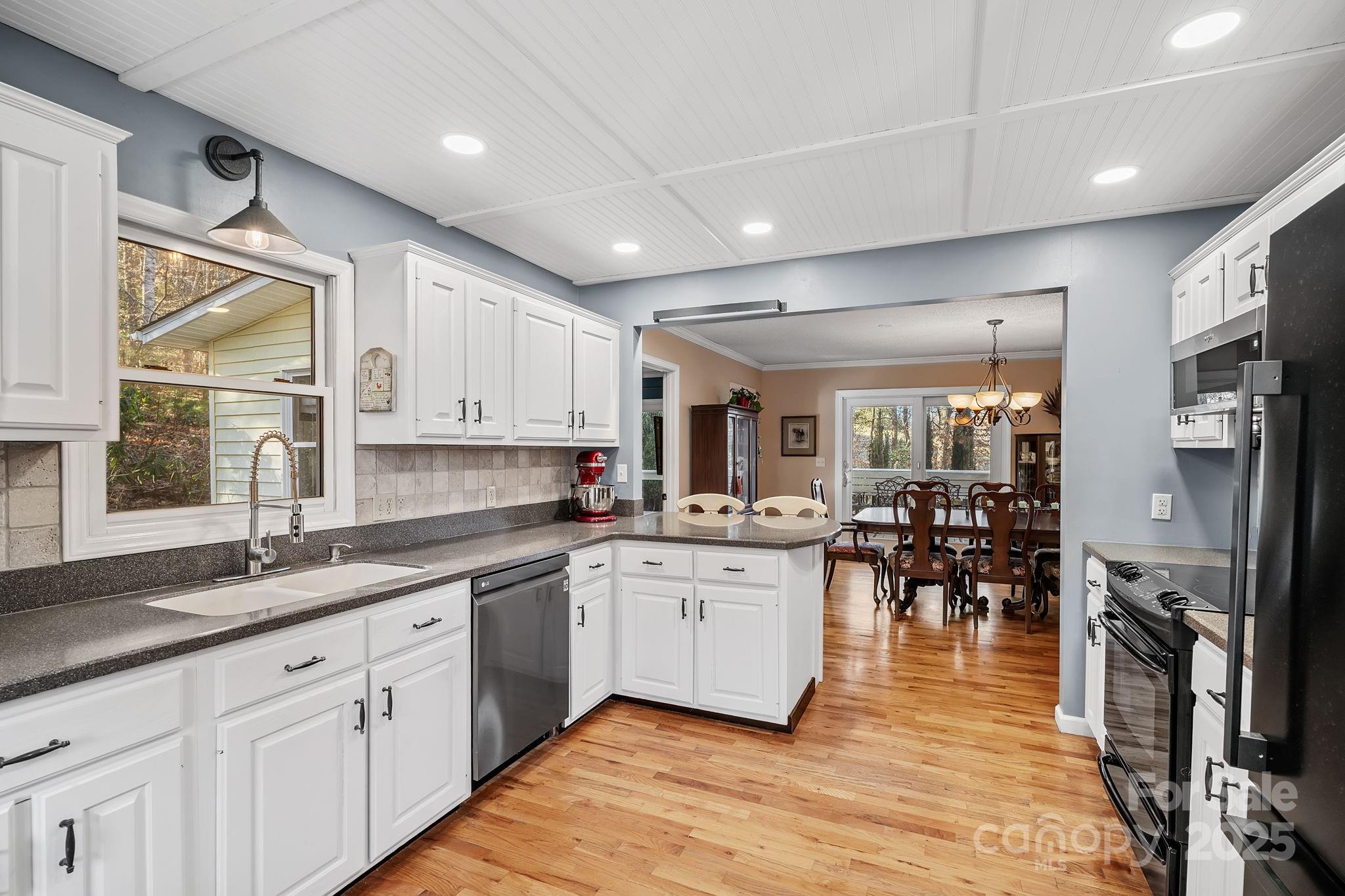 22 Sunset Lane Alexander, NC 28701 - Photo 12 of 48 a kitchen with lots of counter top space and appliances