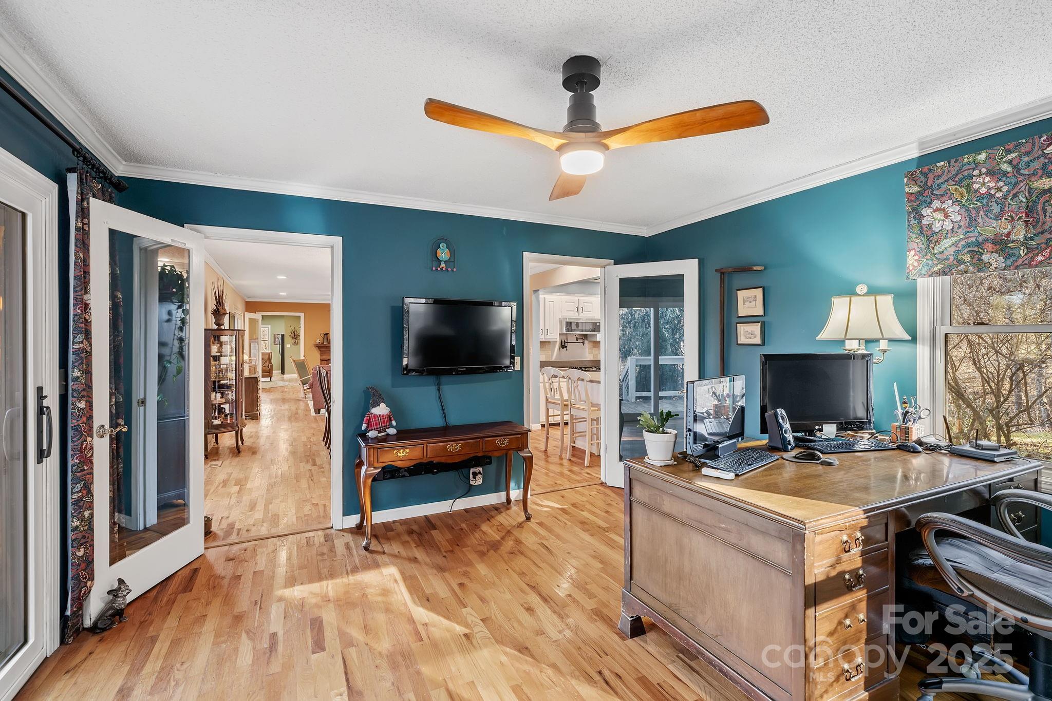 22 Sunset Lane Alexander, NC 28701 - Photo 18 of 48 a living room with furniture and a flat screen tv