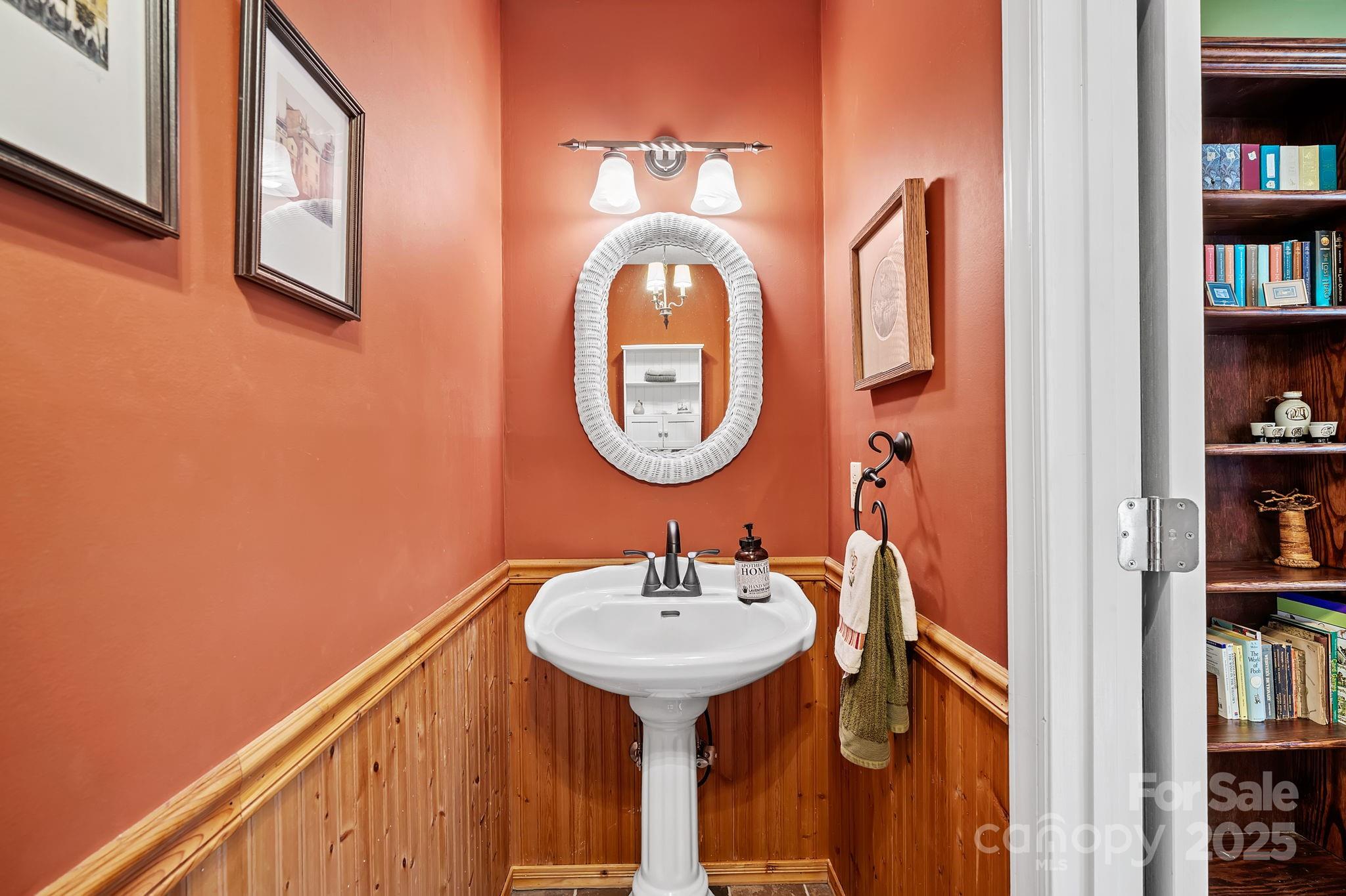 22 Sunset Lane Alexander, NC 28701 - Photo 19 of 48 a bathroom with a sink and a mirror