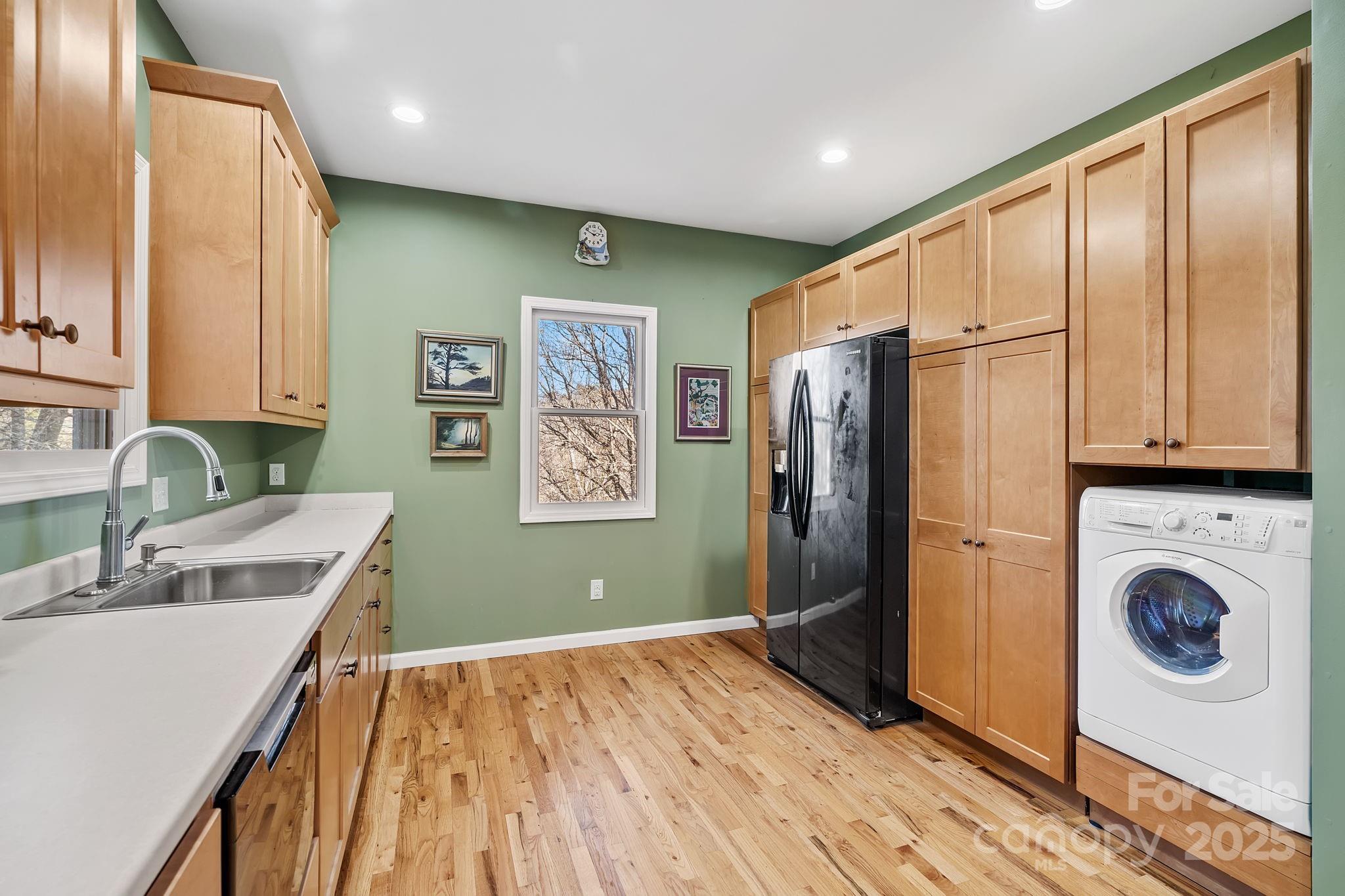 22 Sunset Lane Alexander, NC 28701 - Photo 27 of 48 a kitchen with stainless steel appliances granite countertop a refrigerator and a sink