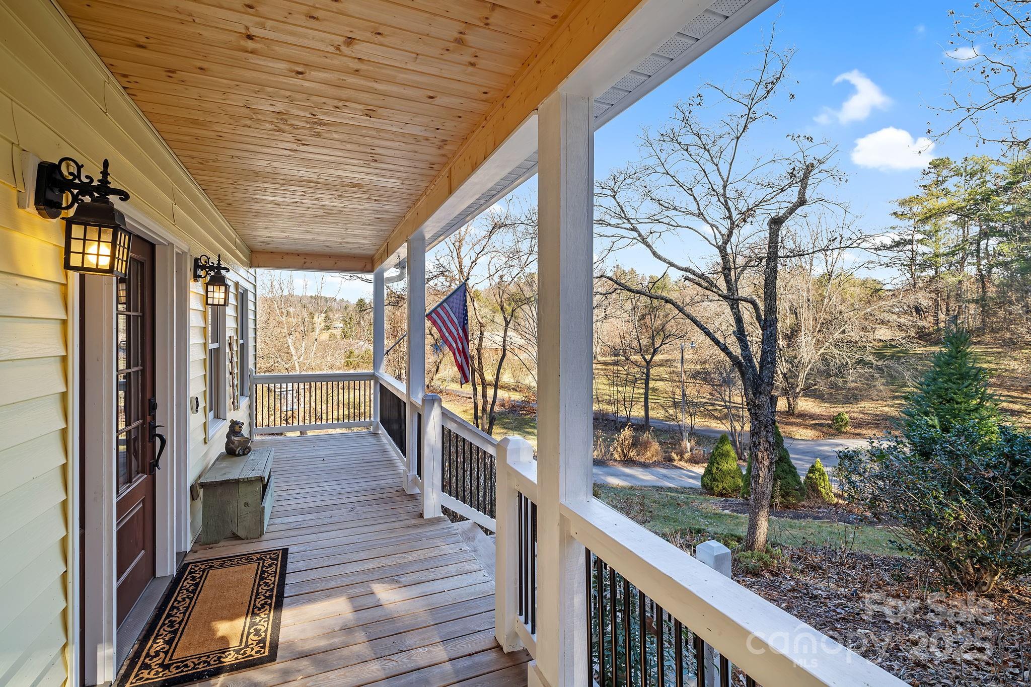 22 Sunset Lane Alexander, NC 28701 - Photo 3 of 48 a view of a porch with wooden floor and outdoor space