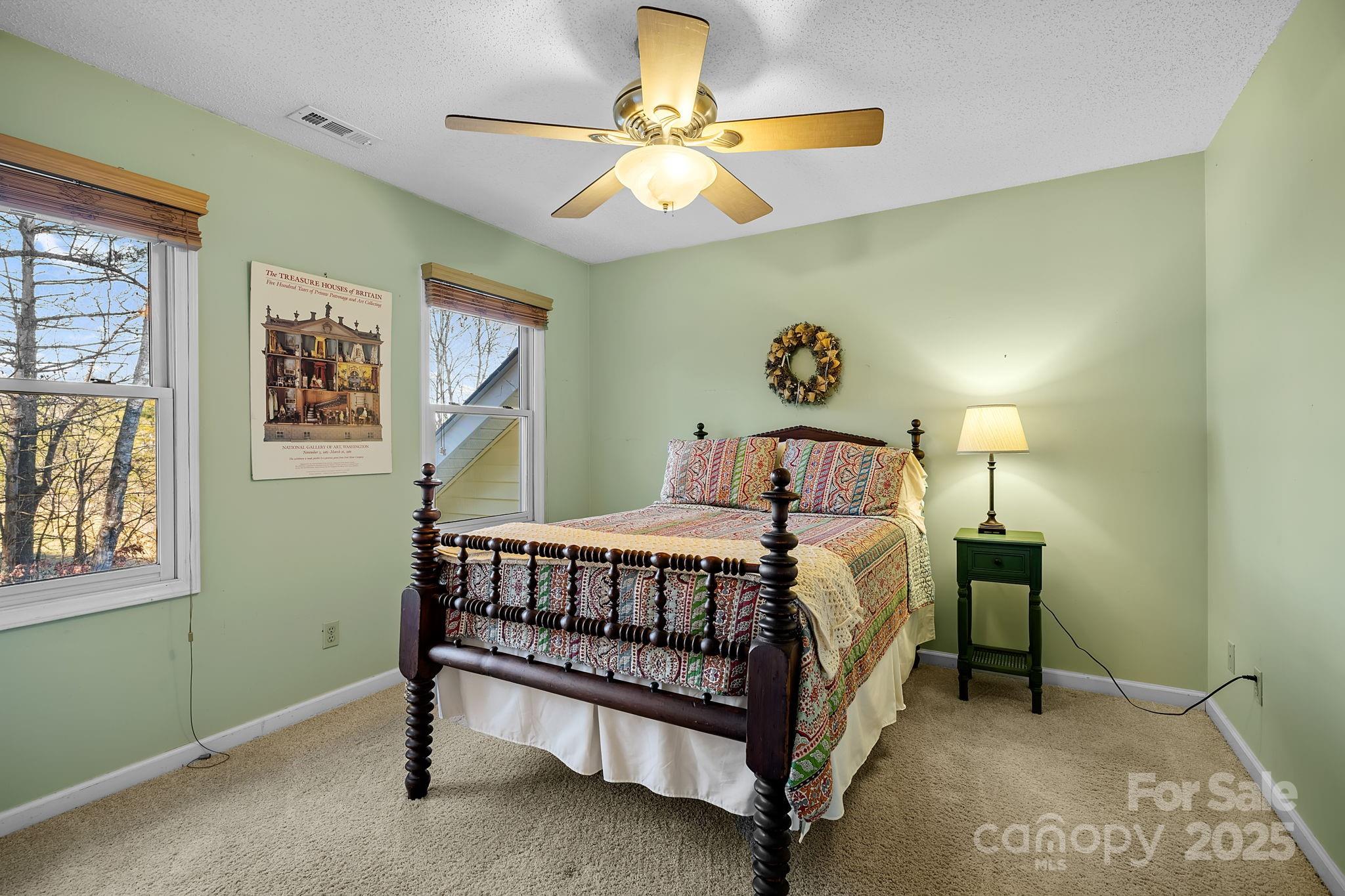 22 Sunset Lane Alexander, NC 28701 - Photo 36 of 48 a bedroom with a bed and a window