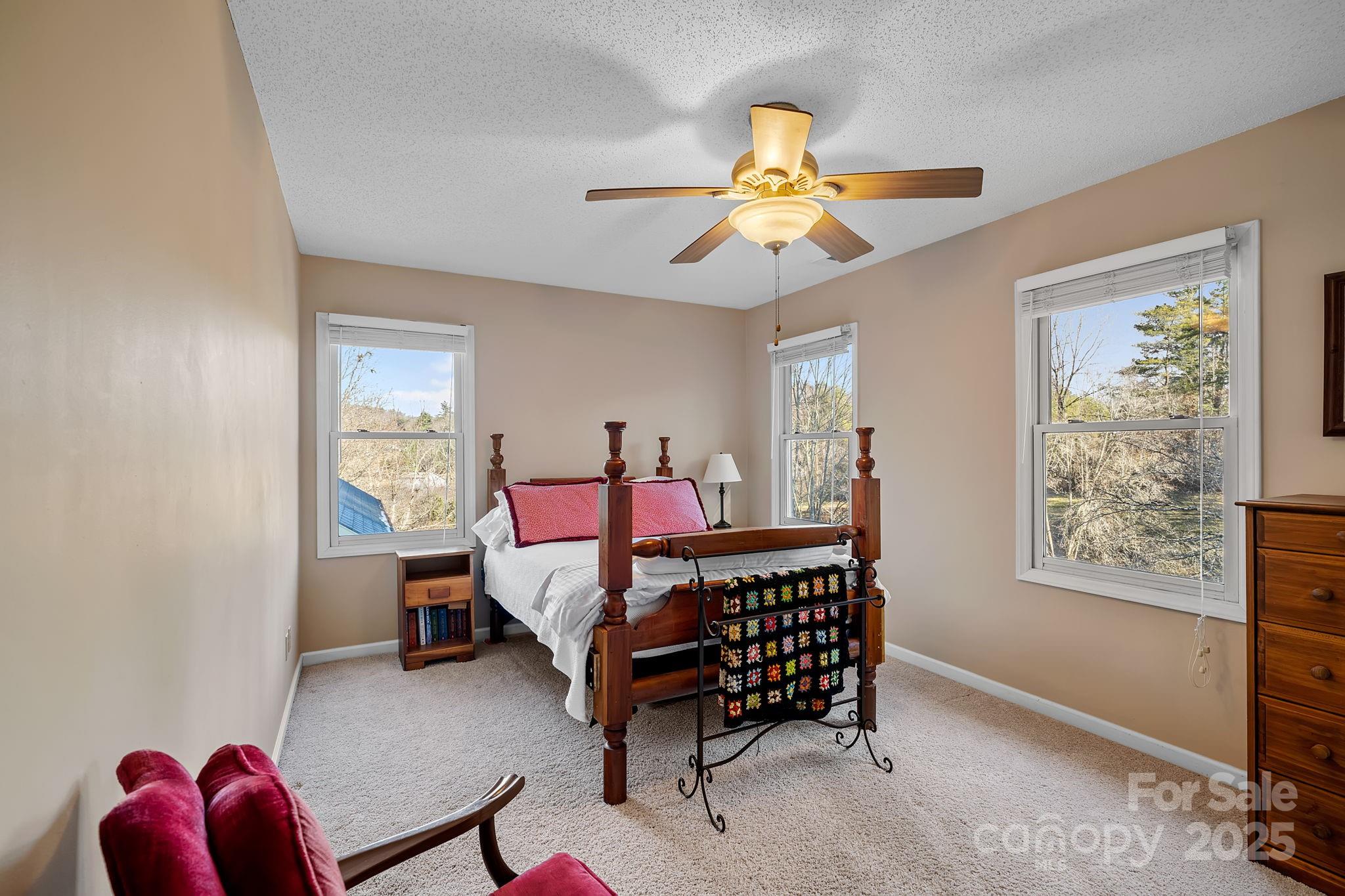 22 Sunset Lane Alexander, NC 28701 - Photo 39 of 48 a bedroom with a bed and a window