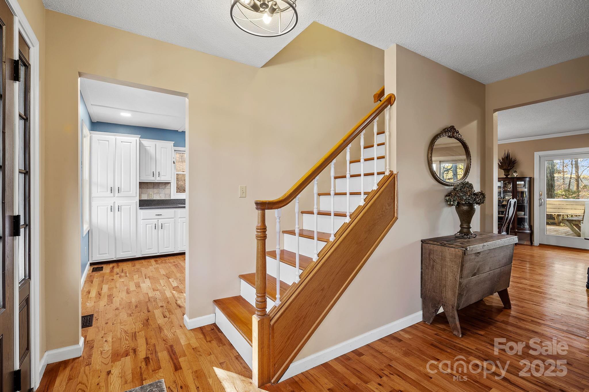22 Sunset Lane Alexander, NC 28701 - Photo 4 of 48 a view of entryway and hall with wooden floor