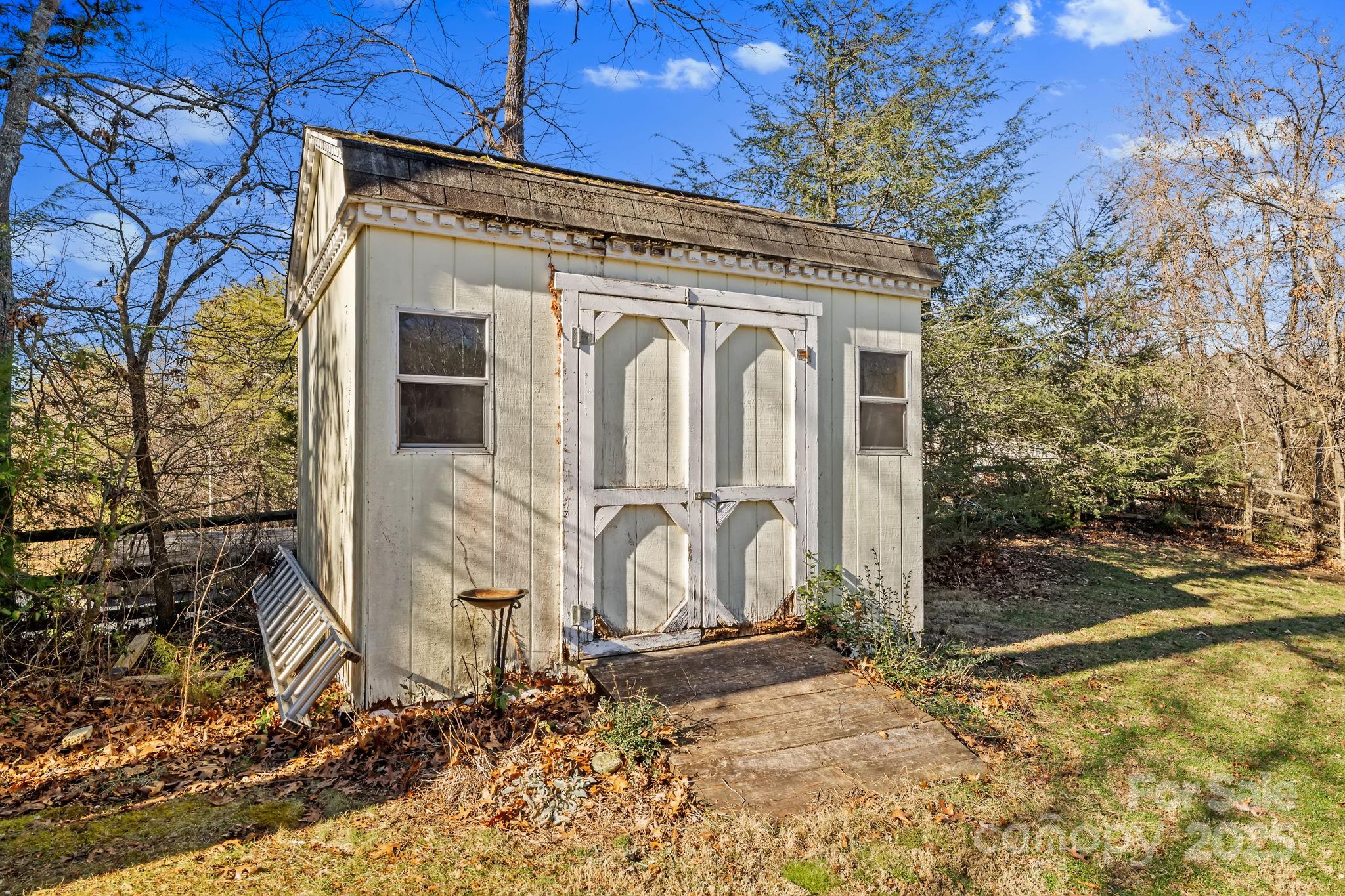22 Sunset Lane Alexander, NC 28701 - Photo 45 of 48 a front view of a house with garden