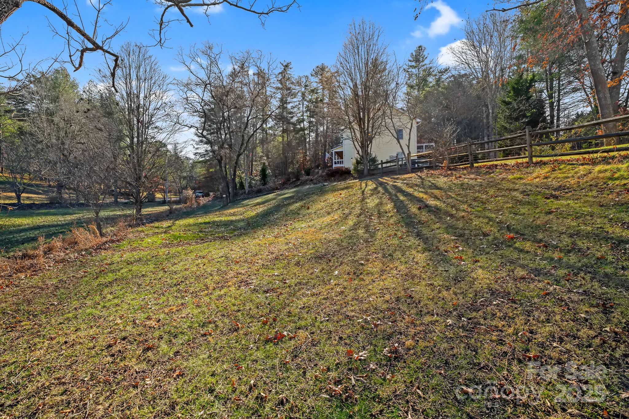 22 Sunset Lane Alexander, NC 28701 - Photo 46 of 48 a view of a swimming pool with an outdoor space and seating area