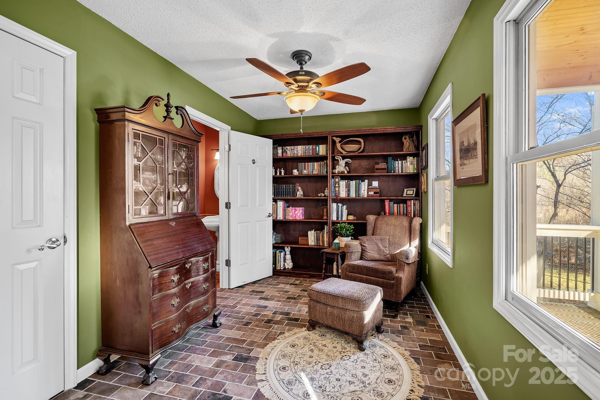 22 Sunset Lane Alexander, NC 28701 - Photo 5 of 48 a living room with furniture and a window