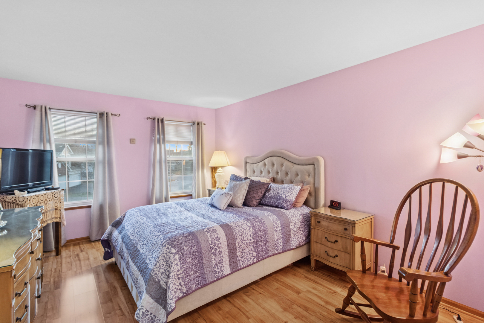 18 Peach Tree Court Algonquin, IL 60102 - Photo 14 of 23 a bedroom with a bed a flat screen tv and dresser