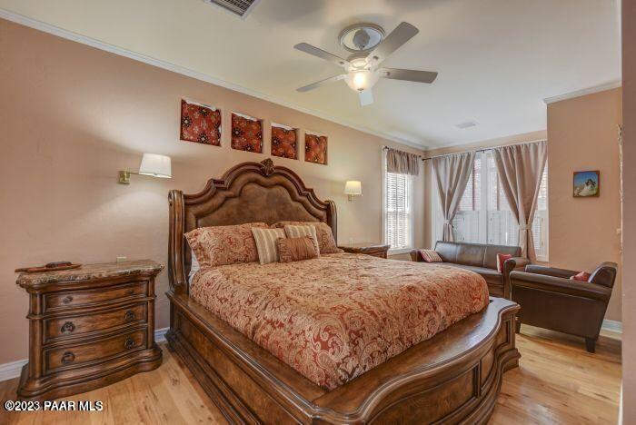 325 East E Union Prescott, AZ 86303 - Photo 9 of 11 a bedroom with a bed and a dresser