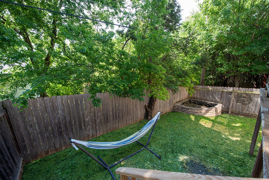 3609 Clawson Road, Unit A Austin, TX 78704 - Photo 14 of 17 A private, grassy yard offers a tranquil retreat with a built-in stone planter and a relaxing hammock.