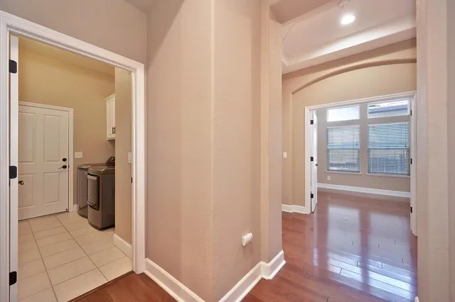 a view of a bathroom with a glass door shower