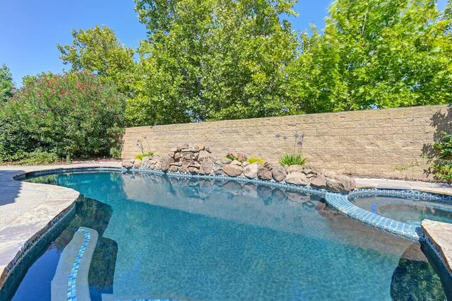 a view of a yard with an outdoor space