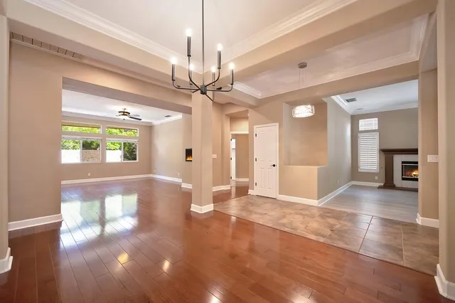a view of a hallway with a chandelier