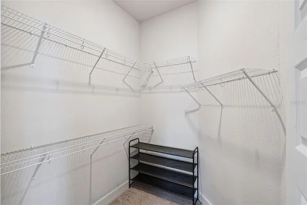 a view of small space with racks on the wall