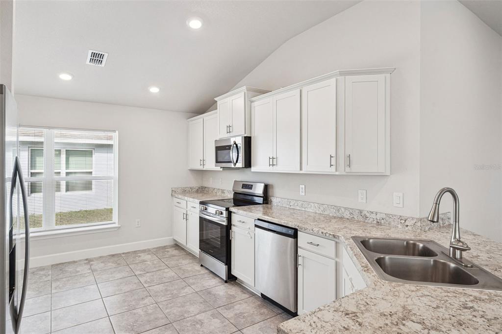 2358 Friendly Confines Loop Davenport, FL 33837 - Photo 7 of 39