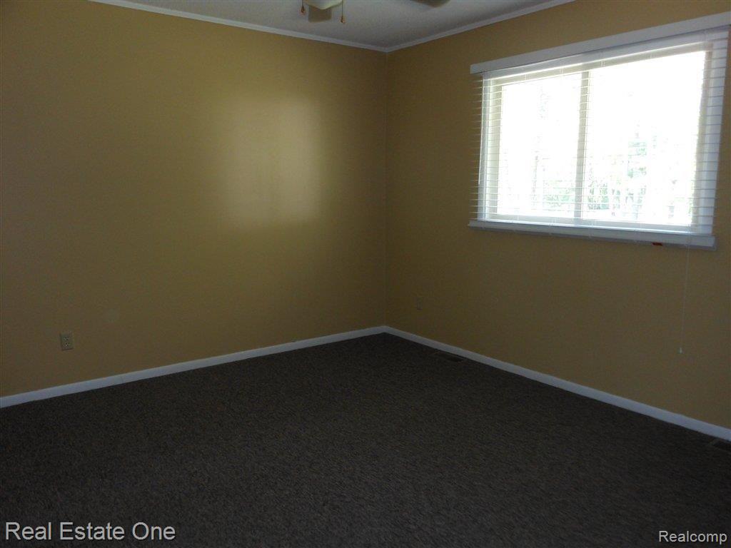 13822 Lone Tree Road Milford, MI 48380 - Photo 15 of 24 Master Bedroom