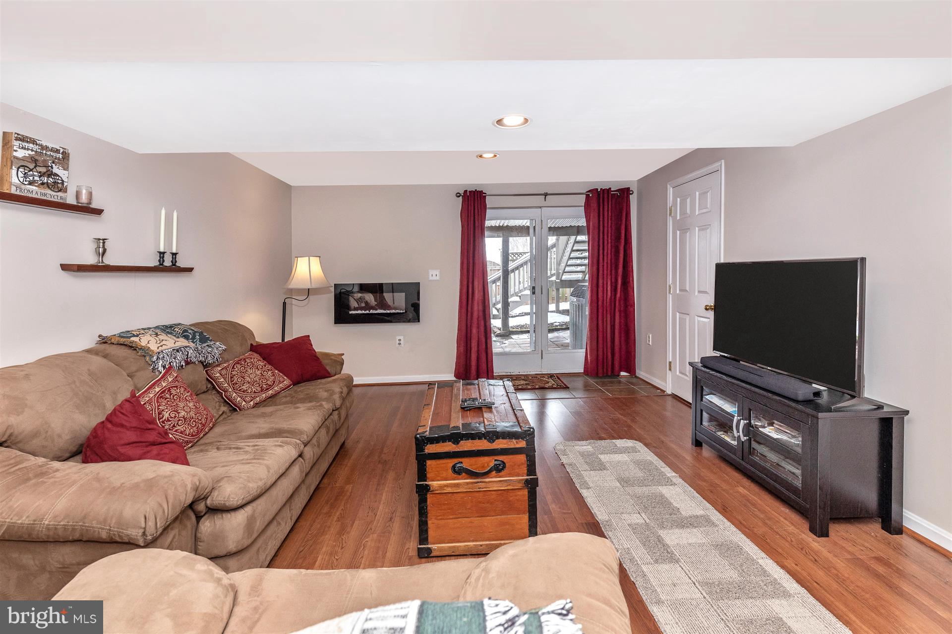 2404 Prentice Court Frederick, MD 21702 - Photo 19 of 33 Spacious family room with slider to back yard.