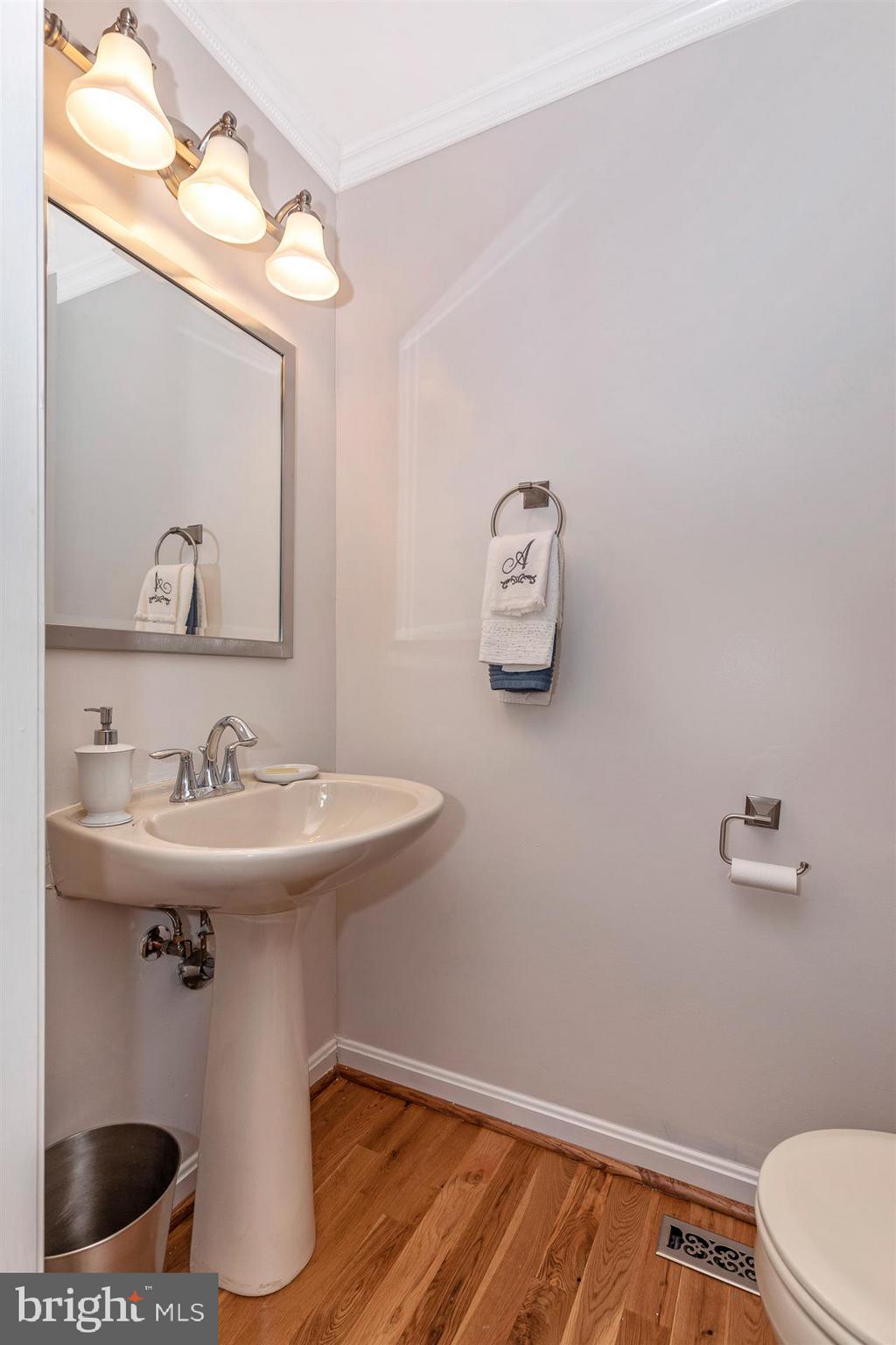 2404 Prentice Court Frederick, MD 21702 - Photo 7 of 33 Convenient powder room on main level.