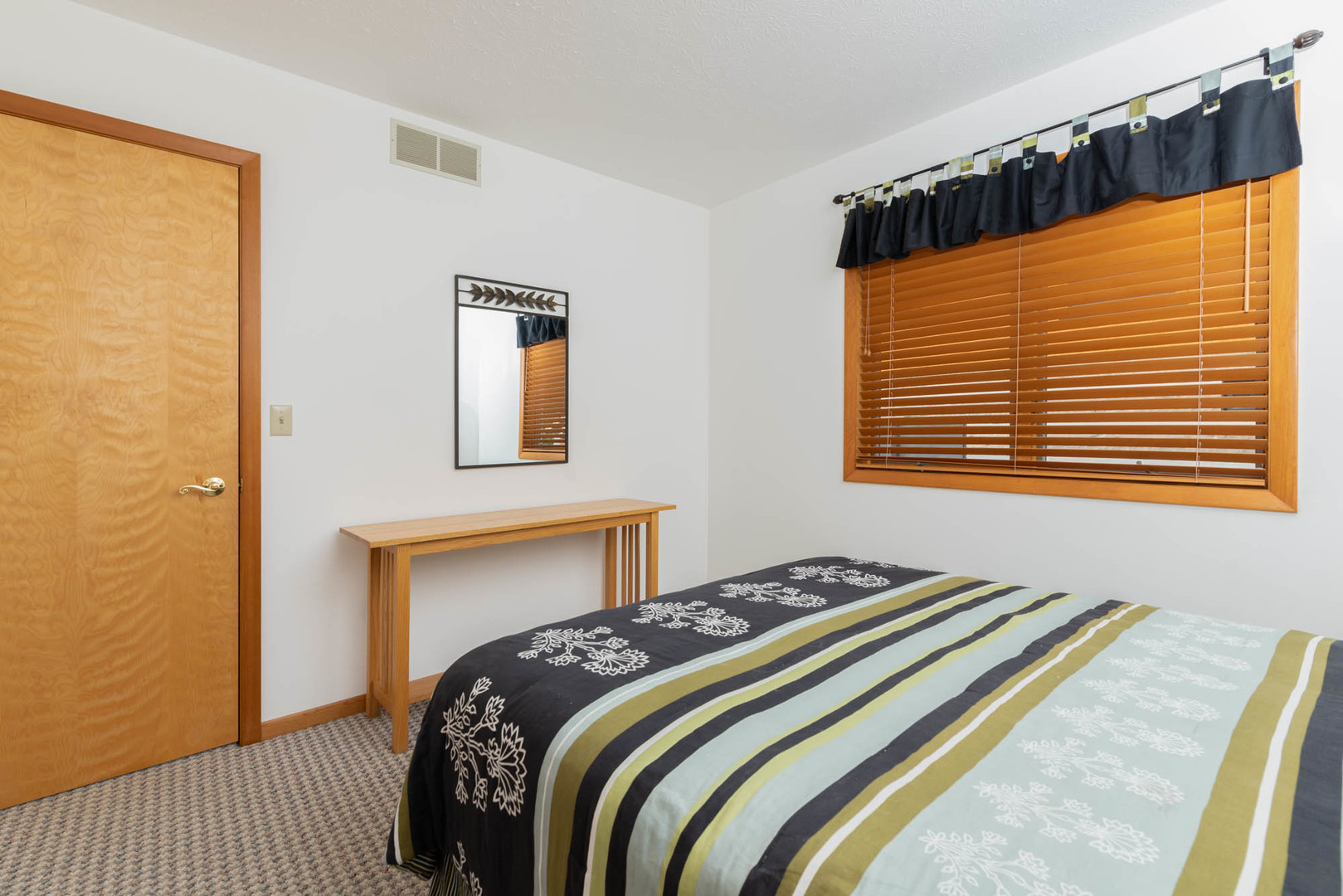 855 Breckenboro Road Lake Summerset, IL 61019 - Photo 17 of 31 a bedroom with a bed and a window