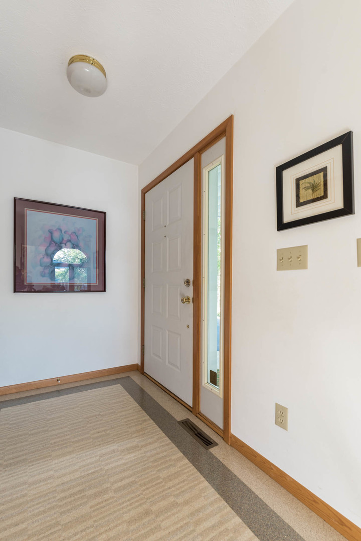 855 Breckenboro Road Lake Summerset, IL 61019 - Photo 6 of 31 a view of a room with wooden floor and window