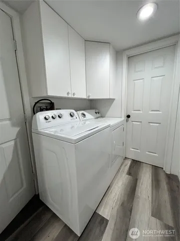 a utility room with dryer washer and dryer