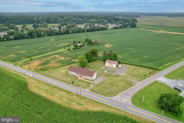 a view of a pool with a yard
