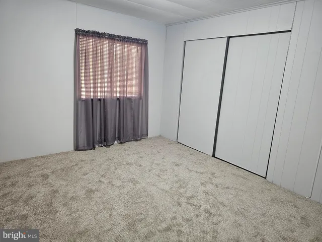 a view of a room with an empty space