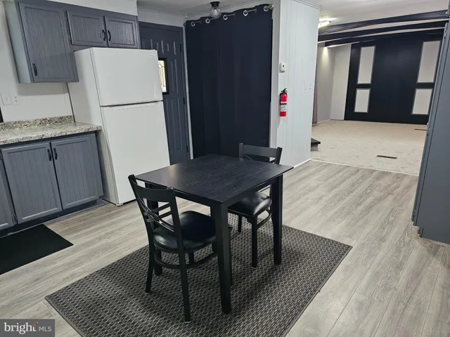 a utility room with closet a washer and dryer