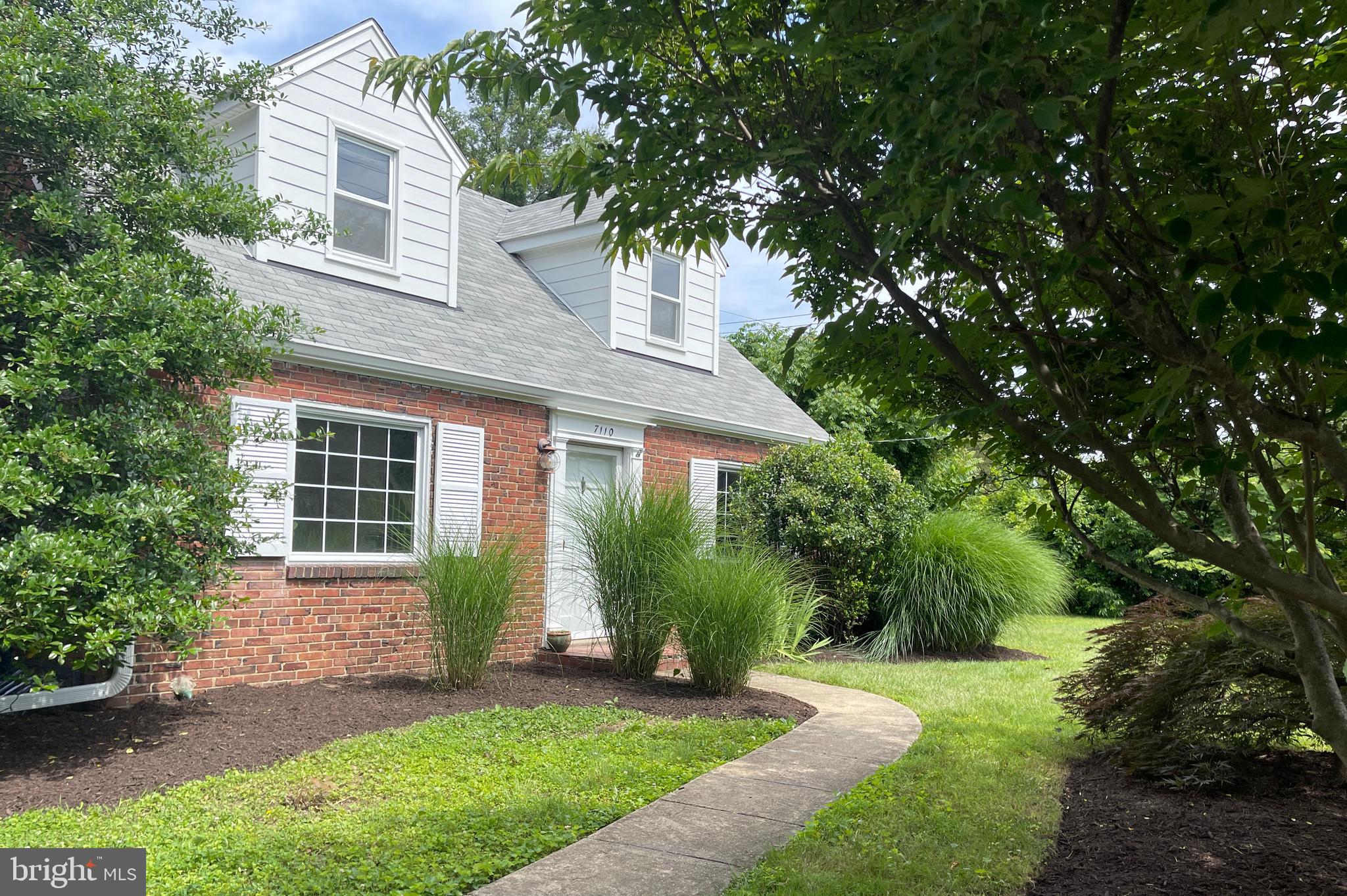 7110 Coventry Road Alexandria, VA 22306 - Photo 2 of 42 a view of a house with a yard