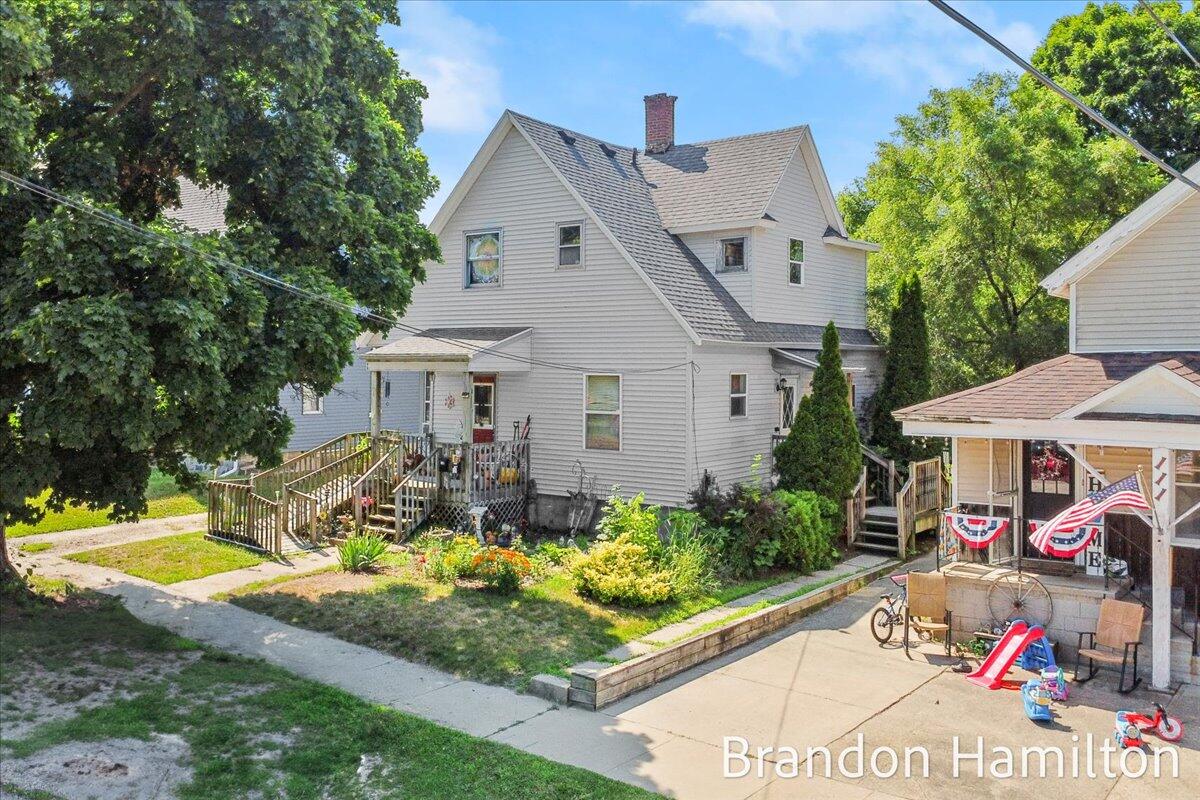 107 West Center Street Belding, MI 48809 - Photo 2 of 35 01-DJI_0393