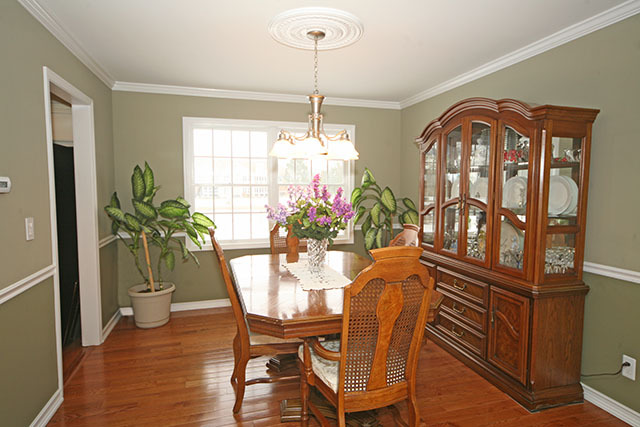 2110 Fairfax Road St. Charles, IL 60174 - Photo 7 of 20 a view of a dining room with furniture window and wooden floor