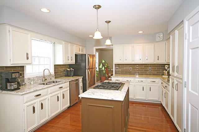 2110 Fairfax Road St. Charles, IL 60174 - Photo 8 of 20 a kitchen with stainless steel appliances granite countertop a sink stove and refrigerator