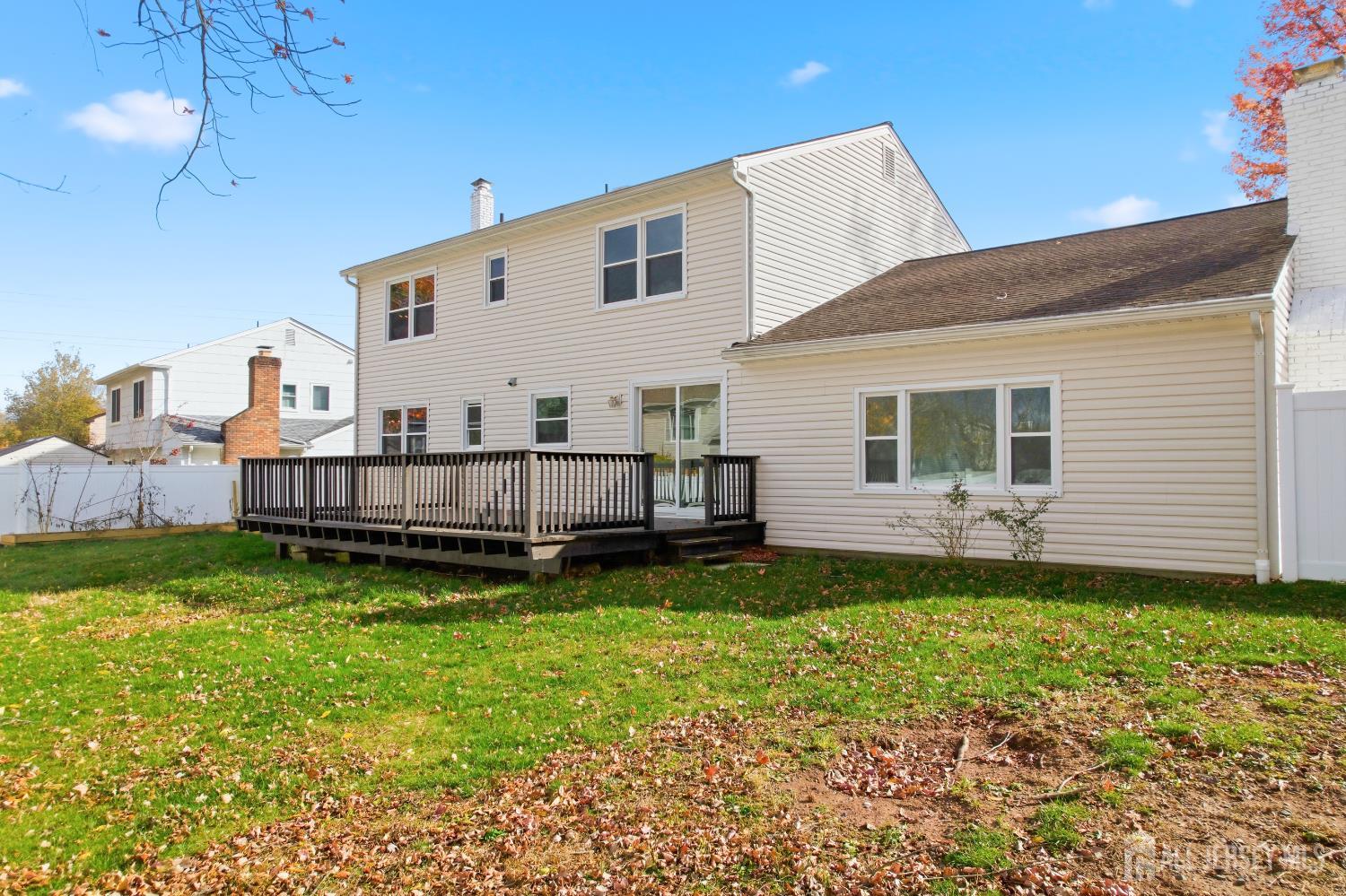 7 Oberlin Court Edison, NJ 08820 - Photo 35 of 40 a view of a house with a yard and sitting area
