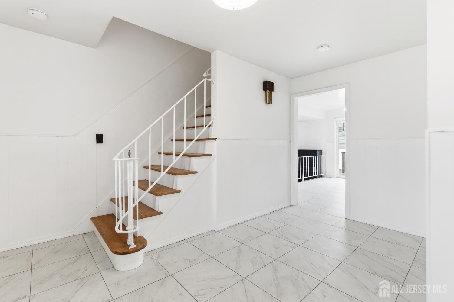 7 Oberlin Court Edison, NJ 08820 - Photo 5 of 40 a view of entryway with hall and stairs